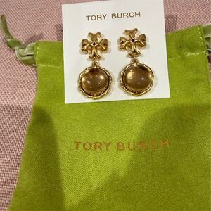 Tory Burch Gold Dangle Earrings with Intricate Detailing special gift